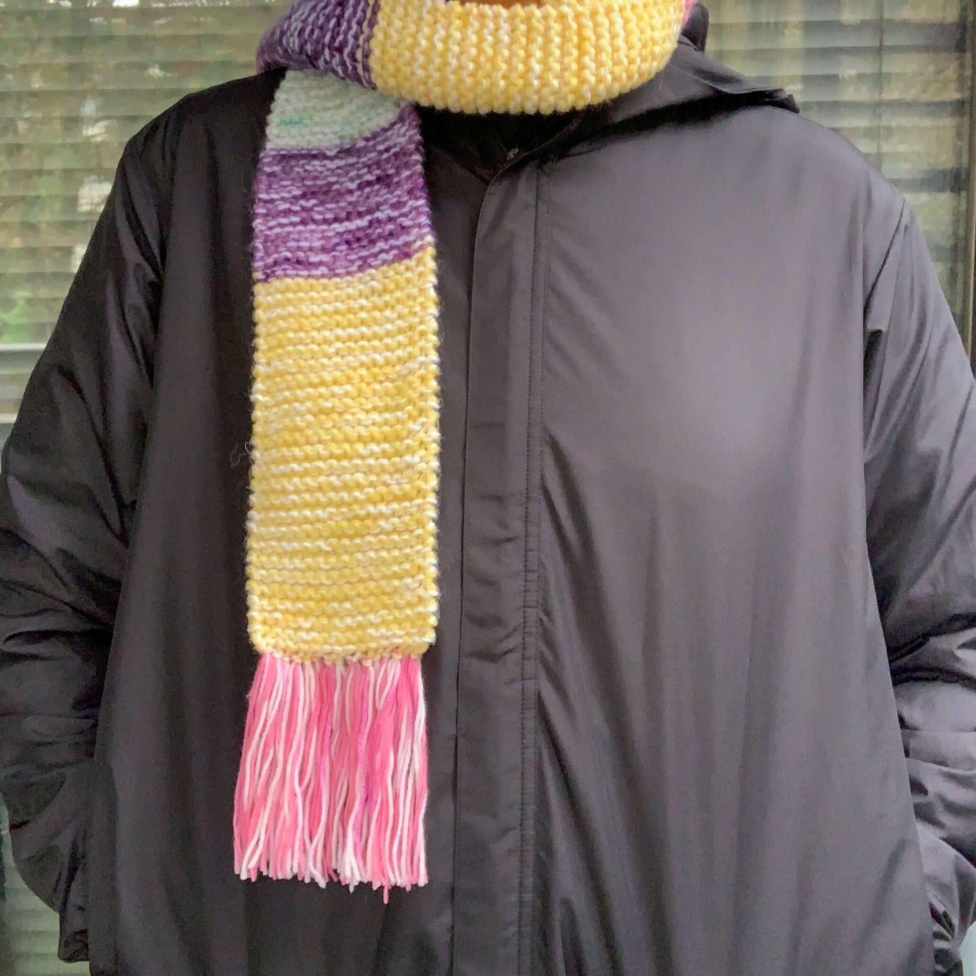 green purple yellow and pink colour block knitted tasseled scarf