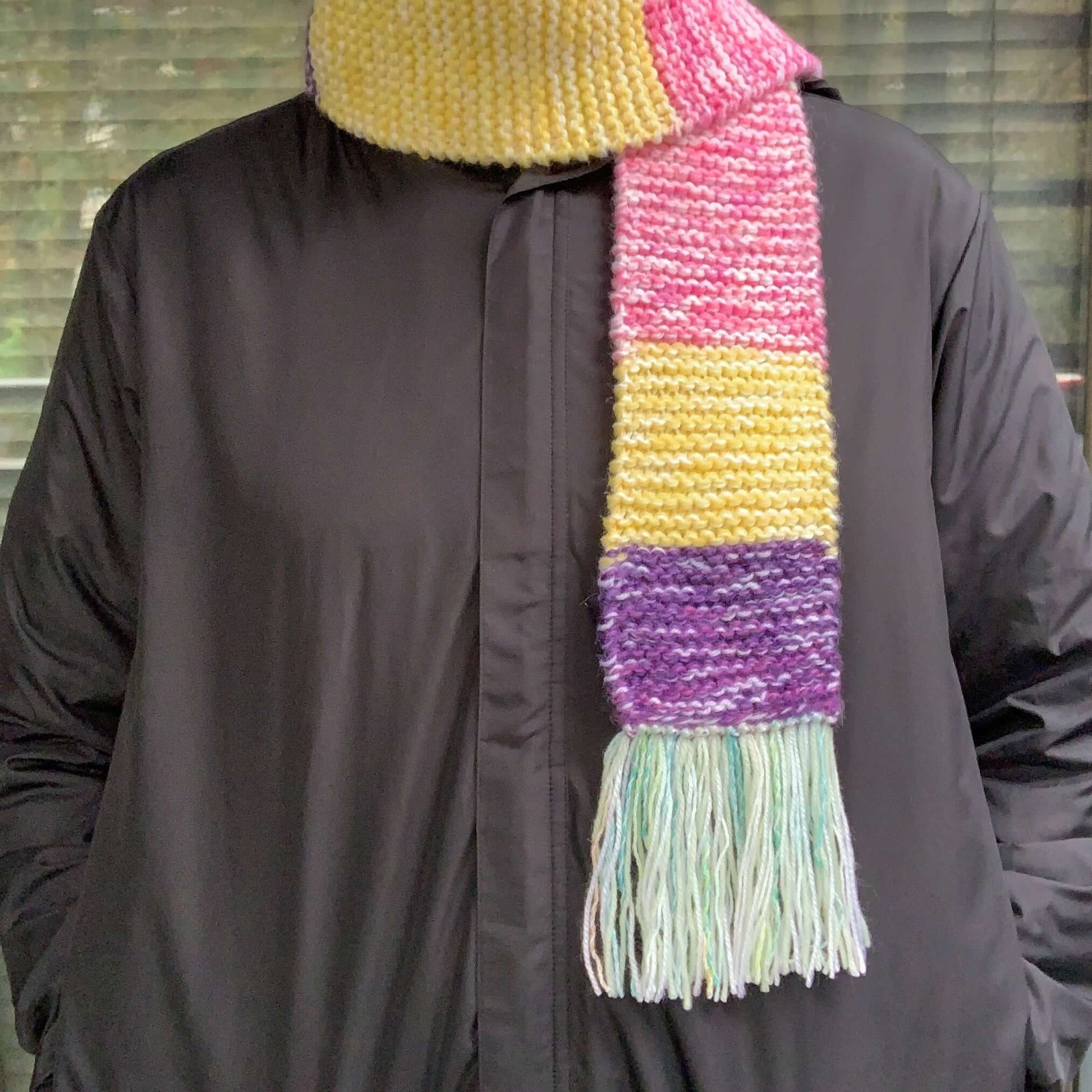 green purple yellow and pink colour block knitted tasseled scarf