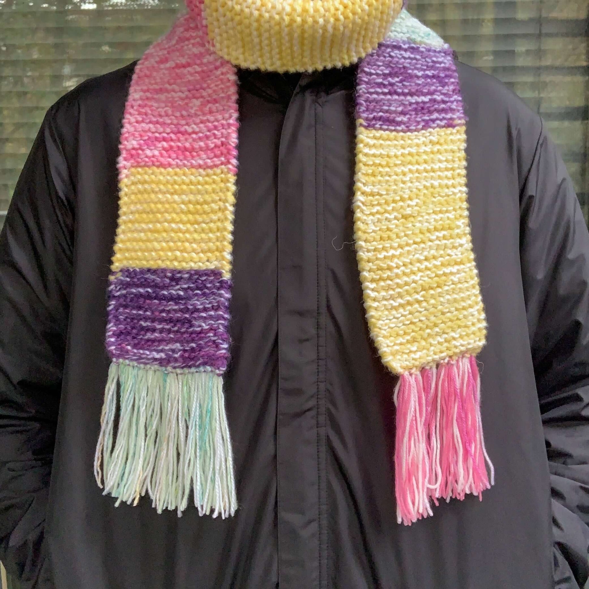 green purple yellow and pink colour block knitted tasseled scarf