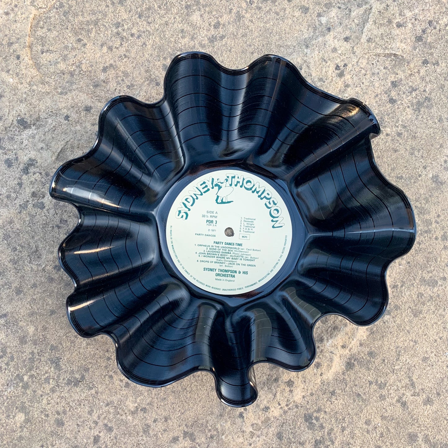 A wavy vinyl record bowl